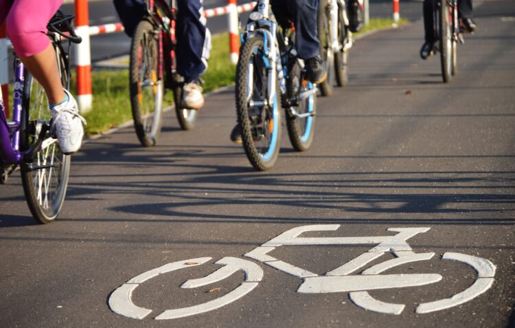 Bicycle road sign on asphalt. Leisure activities